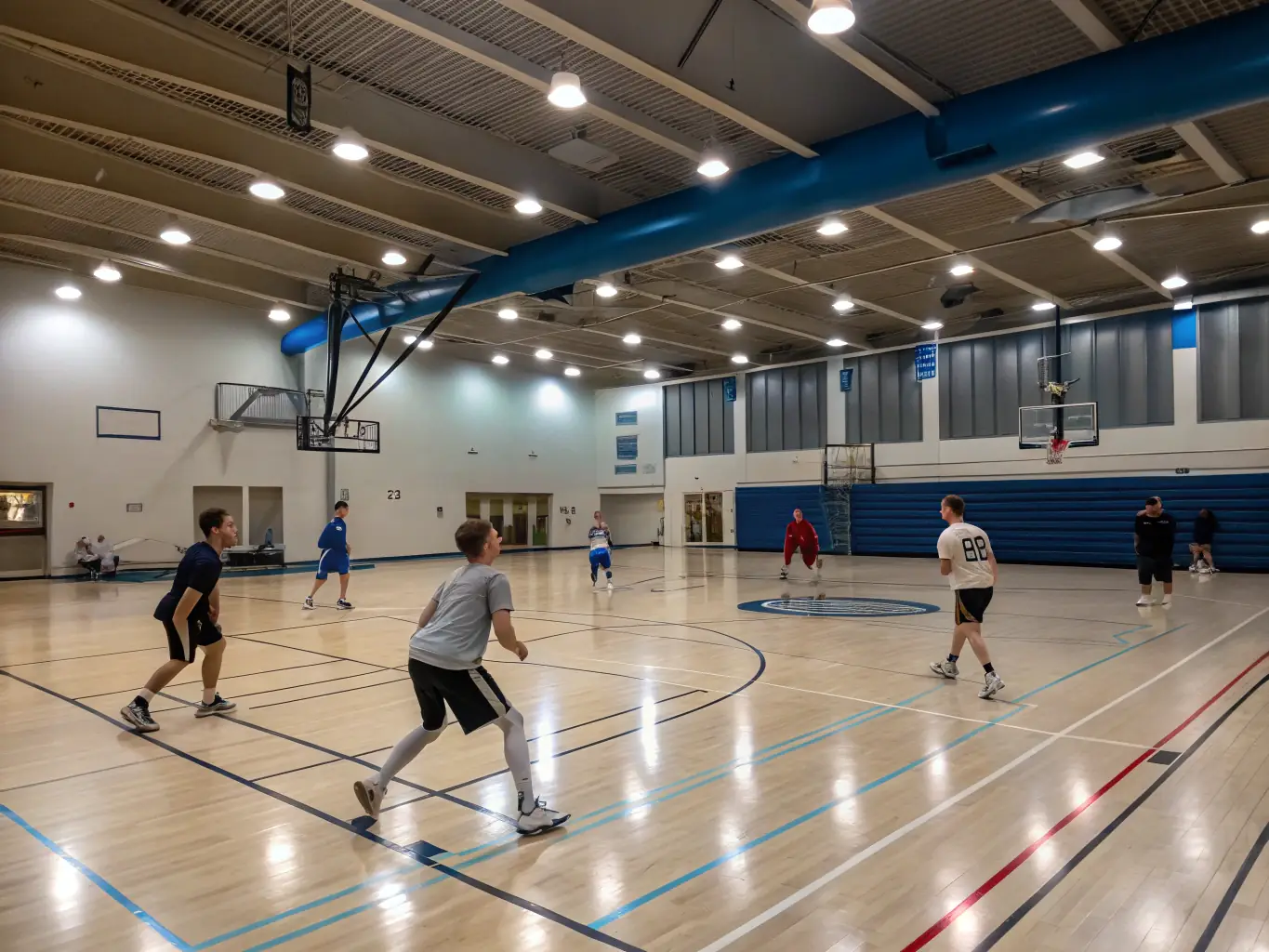 A vibrant image depicting students actively participating in a basketball training session at DYNAMIC CLUB, focusing on teamwork and skill development.